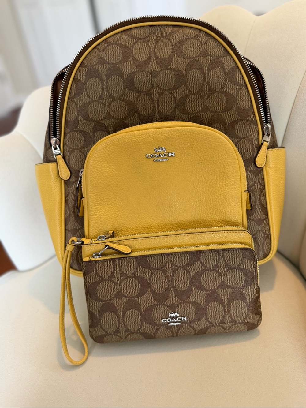 Butter Yellow Coach Backpack and Pouch